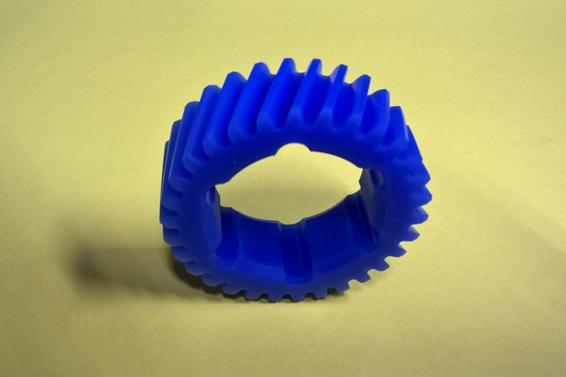 Helical crown gear made of special plastic material